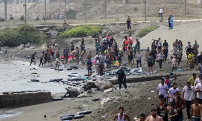 Ceuta migrant crisis July 2026 on the Spanish coastline